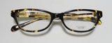 Oliver Peoples Devereaux Eyeglasses featuring a stylish tortoiseshell frame with demo lenses.