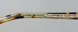 Close-up of Oliver Peoples Devereaux Eyeglasses frame detailing and size markings.