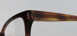 Side view of Oliver Peoples Devereaux Eyeglasses showcasing the premium acetate frame and design.