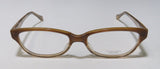 Oliver Peoples Devereaux Eyeglasses showcasing premium acetate frame design with demo lenses.