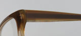 Close-up of the frame design of Oliver Peoples Devereaux Eyeglasses showcasing premium acetate material.