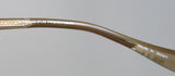 Oliver Peoples Devereaux Eyeglasses frame detail showing brand logo and 'Made in Japan' inscription.