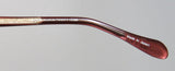 Oliver Peoples Devereaux Eyeglasses close-up of the temple showing brand details and made in Japan engraving.