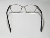 Bottega Veneta eyeglasses showcasing a sleek titanium frame with demo lenses and lightweight design.