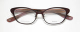 Bottega Veneta Bv6505j Eyeglasses featuring a titanium frame and demo lenses with logo.
