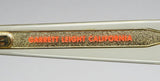 Garrett Leight Gl 3030 Sunglasses logo detail in gold and orange on premium acetate frame.