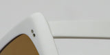 Close-up of Garrett Leight Gl 3030 Sunglasses showing white frame and brown lenses.