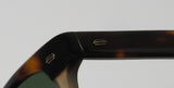 Close-up of Garrett Leight Lo-B Sunglasses showcasing the durable acetate frame and design details.
