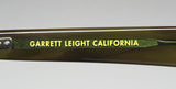 Garrett Leight Lo-B Sunglasses branding detail, showcasing quality craftsmanship and designer style.