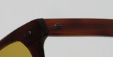 Close-up of Garrett Leight Lo-B Sunglasses showcasing premium acetate frame and stylish design.