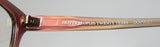 Oliver Peoples Devereaux Eyeglasses close-up of branding on temple with logo detail.